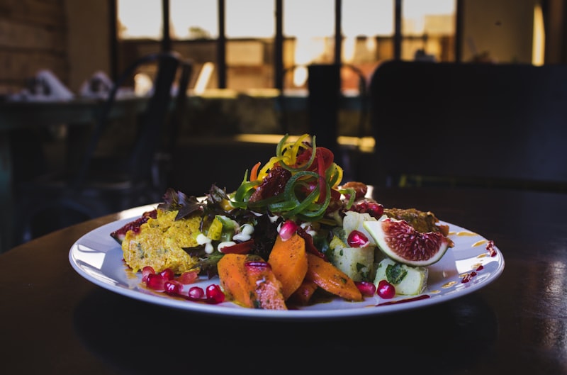 Seasonal kaiseki dish artfully presented on ceramic plate